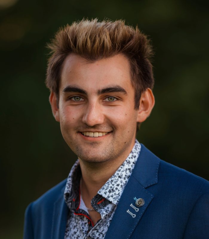A headshot of Evan Nassif.